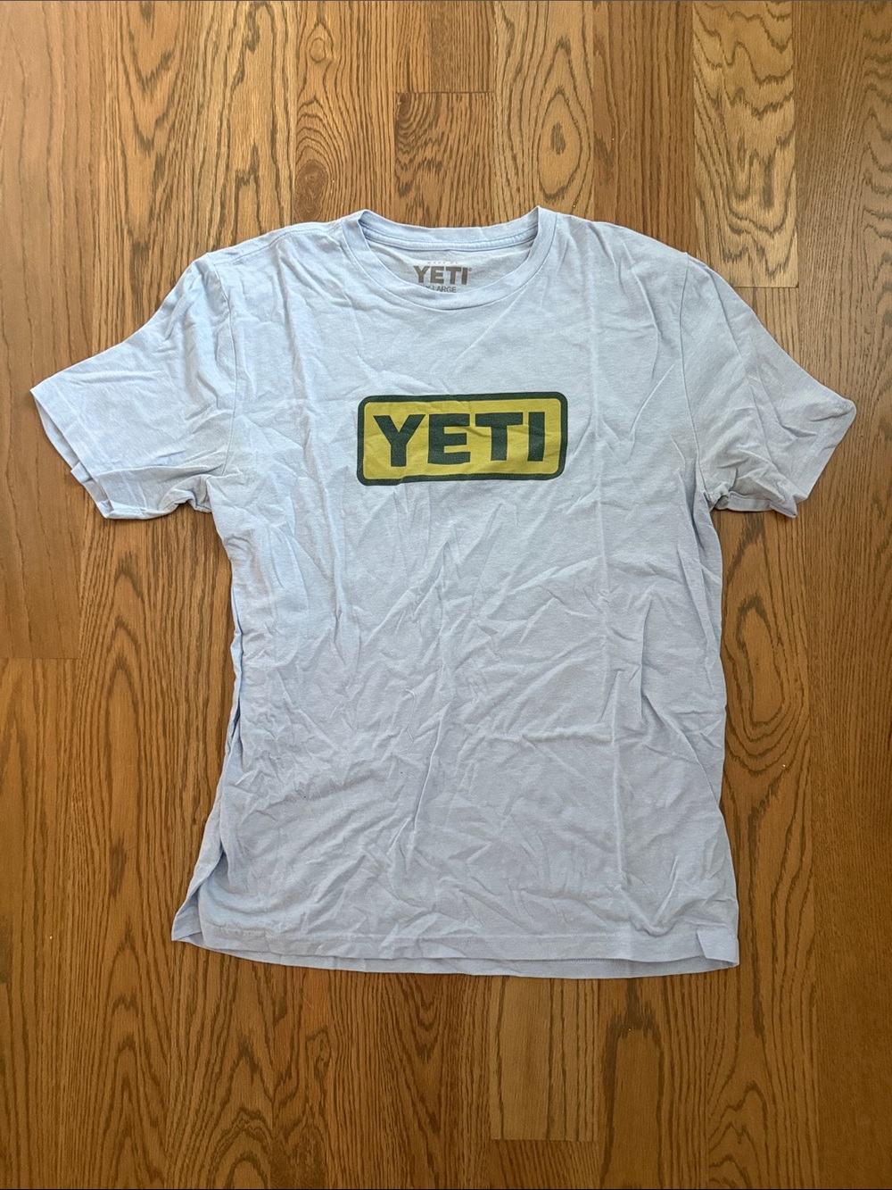 Yeti Light Blue Short Sleeve Tee with Yellow Logo